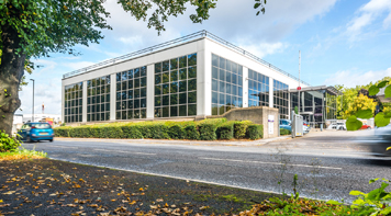 Auxillis head office stands proud in central Bath.